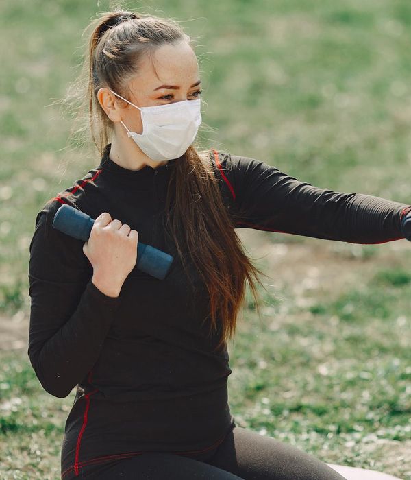 Woman looking confidently into the distance with vibrant energy